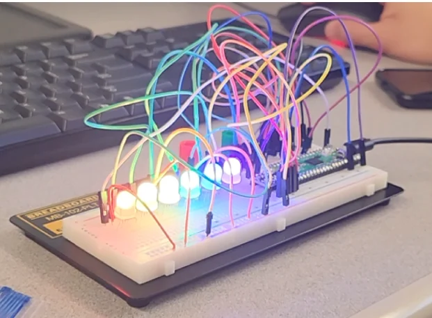 Colorful individually controlled LEDs connected to a Raspberry Pi Pico on a breadboard